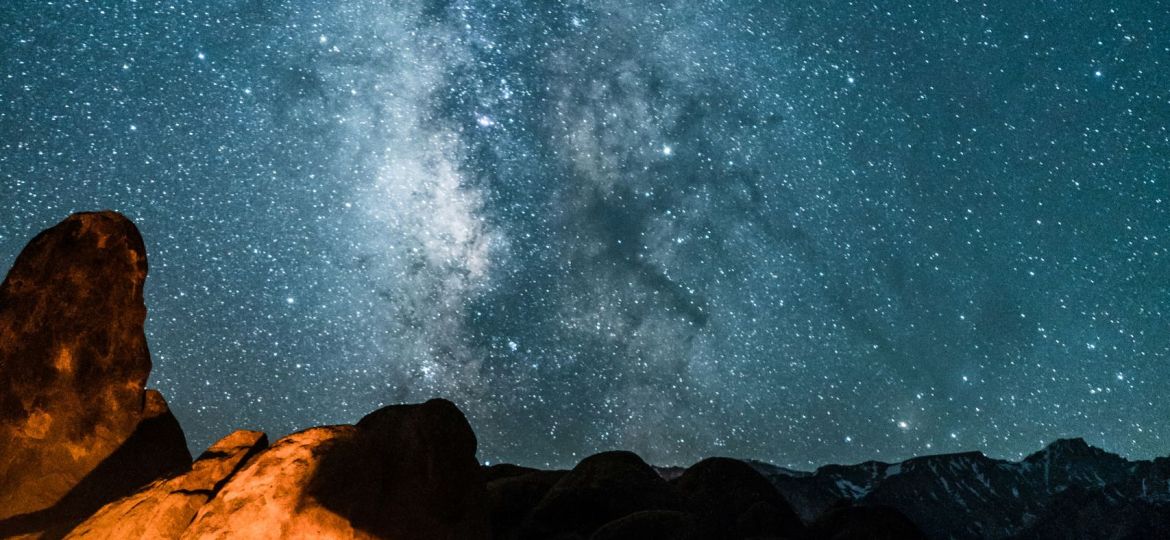 campers under milky way