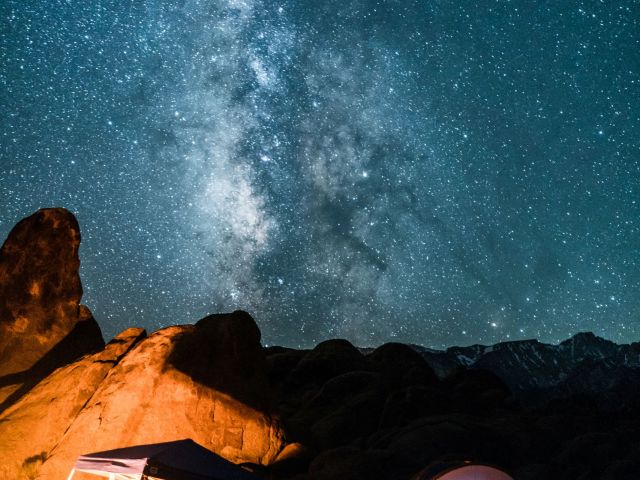 campers under milky way